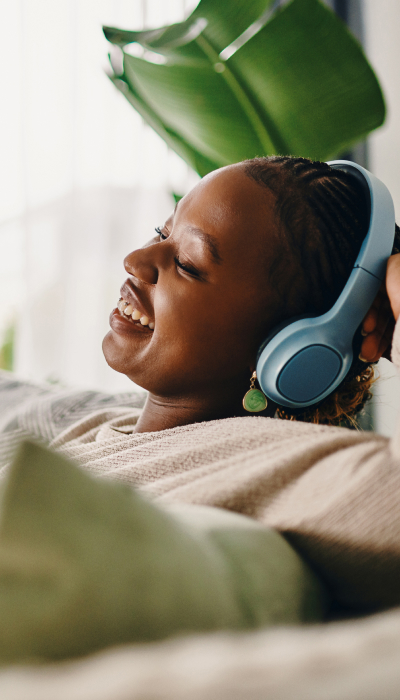 woman-relaxing-with-a-headphone-in-your-ears